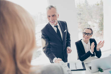 Handsome, elegant, classic, attractive, joyful, cheerful aged man with bristle, grey hair in suit...