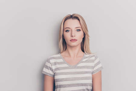 Close up portrait of focused minded concentrated pondering pensive attractive woman with modern...