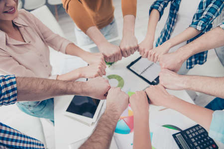 Progress motivation deal agreement diversity achievement handshake concept. Top high angle view...