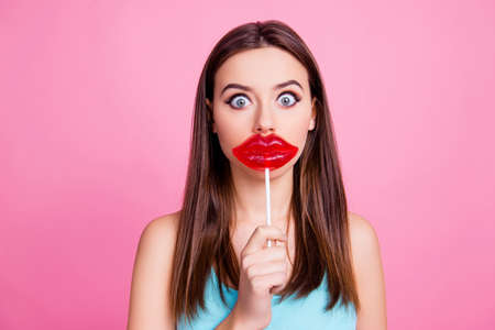 Concept of having lips injection. Portrait of shocked amazed wondered with big round eyes beautiful...