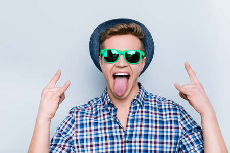 Heavy metal listen music lover concert modern people person fan mad concept. Close up portrait of...