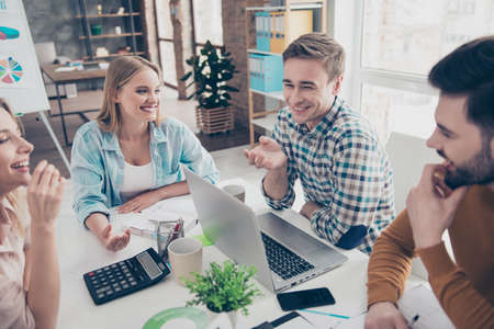 Stylish, attractive, confident, executive, corporate business people in casual outfits enjoying...