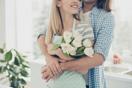 Cropped portrait of sensual romantic lovely couple, handsome man preparing surprise for lover. Idyllic daydream enjoyment comfort pleasure conceptの写真素材