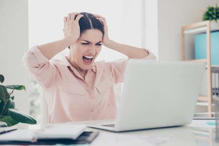Portrait of irritated secretary, rage financier, mad IT, lawyer, unhappy crazy accountant holding...