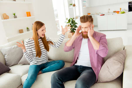 Dispute angry emotion expression gesture headache two people resent love blame guilt crazy mad...