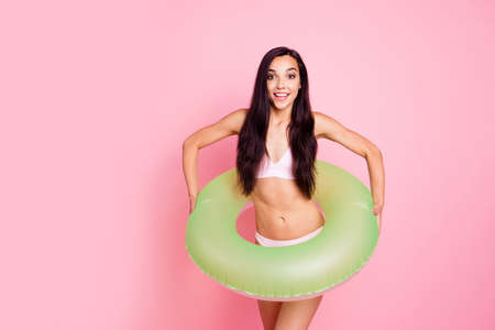 I can't swim please teach me! Close up studio photo portrait of glad cheerful rejoicing funny funky person holding lifeguard in hands isolated bright pastel backgroundの写真素材