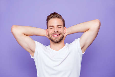 Portrait of handsome cheerful attractive bearded guy in white ts