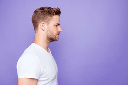 Profile side view of handsome bearded minded street style guy, iの写真素材