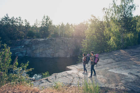 Exploring, wandering, expedition concept. Two people in mountain
