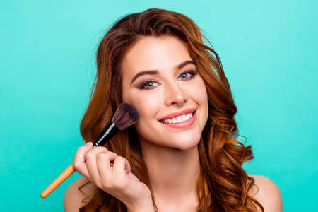 Portrait of attractive, charming young girl preparing for the daの写真素材