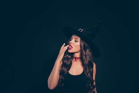 Lets begin the creepy feast Close up of curly brunette lady wiの写真素材