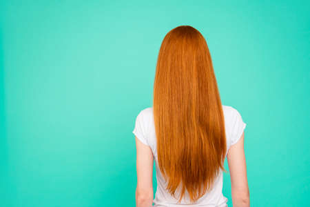 Rear back view of nice attractive bright vivid shiny red straighの写真素材