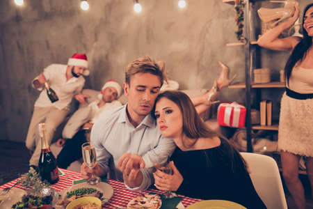 Two beautiful attractive stylish elegant exhausted minded peopleの写真素材