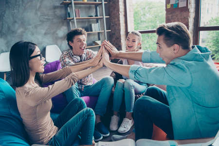 Incredibly happy, emotional, youth diversity group clap their ha