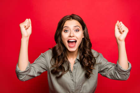 Close up photo of brunette lady in casual shirt wear look at cameraの写真素材