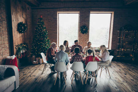 Rear back behind view of noel evening family gatheringの写真素材