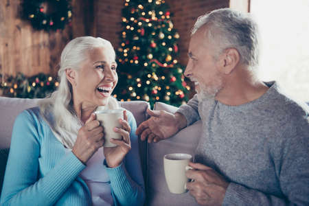 Profile side view portrait of nice charming lovely beautiful coupleの写真素材