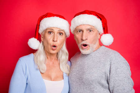 Closeup portrait of two amazed confused puzzled people charmingの写真素材