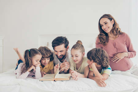 Big nice beautiful cheerful adoptive lovely familyの写真素材