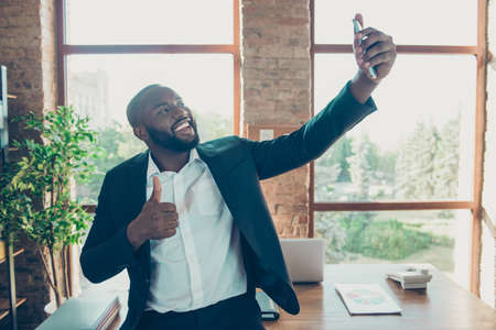 Elegant stylish classy cheerful positive business shark manの写真素材