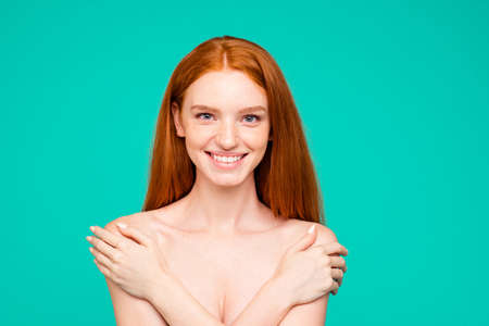 Healthy body concept. Portrait of cheerful nice perfect nude girl.の写真素材