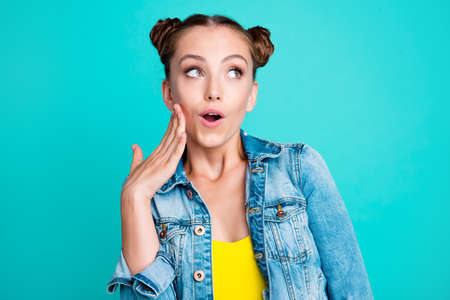 Portrait of girl posing with blue background.の写真素材
