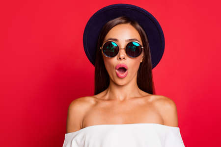 Portrait of Woman posing with red background.の写真素材