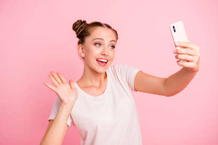 Portrait of girl posing with pink background.の写真素材