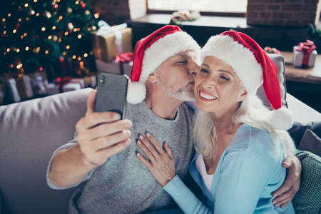 Two cheerful glad delighted sweet tender mature elderly marriedの写真素材