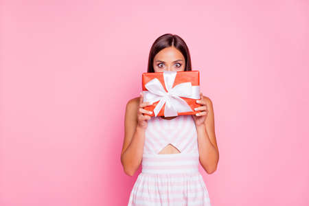 Portrait of style stylish funky funny lady holding presentの写真素材