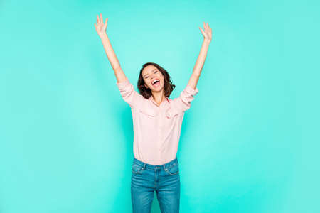Cool nice cute positive optimistic cheerful emotional attractive girl raising hands up closed eyes...