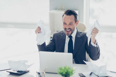 Aggression face analyst banker broker ceo man in formal wear look on modern technology monitor sit...