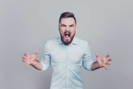 Close up studio photo portrait of bad frightening rage arguing eの写真素材