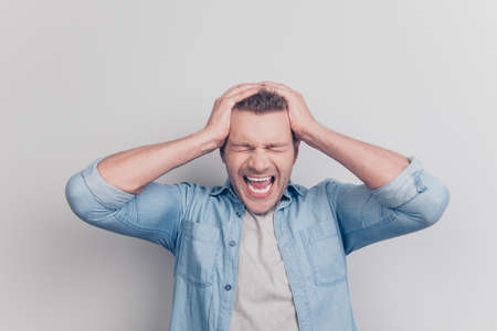 My head ready explode Photo of bad feeling man with closed eyes