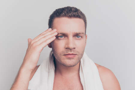 Close up photo of handsome attractive calm man look on mirror seの写真素材