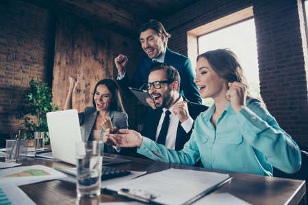 Profile side low angle view portrait of four nice stylish eleganの写真素材