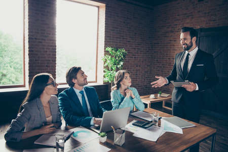 Portrait of four stylish elegant classy beautiful focused cheerfの写真素材