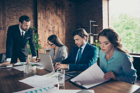 Portrait of four stylish elegant classy beautiful focused concenの写真素材