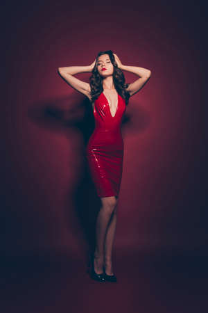 Full length body size vertical well-groomed lady in red dressの写真素材