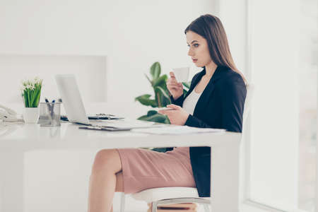 Profile side view portrait of nice beautiful focused serious ladの写真素材