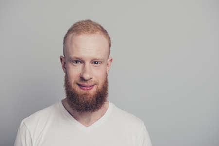 Portrait of good-looking gentleman stand isolated on light gray