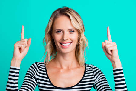 Nice-looking pretty dreamy charming lady in trendy casual style