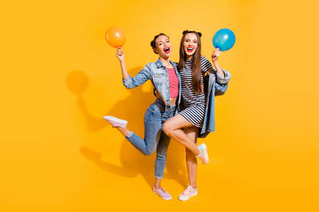 Full legs length body size portrait of two funky funny brunette