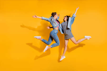 Full legs body size portrait of two sweet gorgeous glad positive