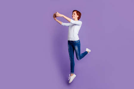 Close up full length size body photo of jump pretty charmingの写真素材