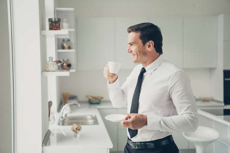 Profile side view portrait of nice elegant attractive handsomeの写真素材