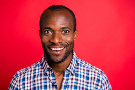 Close-up portrait of nice handsome attractive cheerful cheery optimistic guy wearing checked shirt...