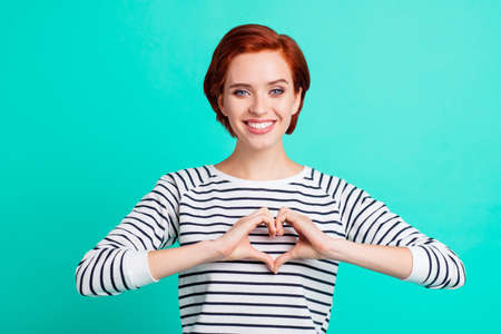 Close up portrait of beautiful cheerful foxy attractive she her lady fingers hands making figure...