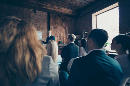 Rear back behind view of crowd business people management listen