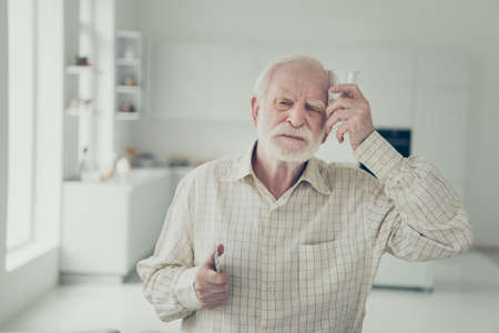 portrait of grey haired old manの写真素材